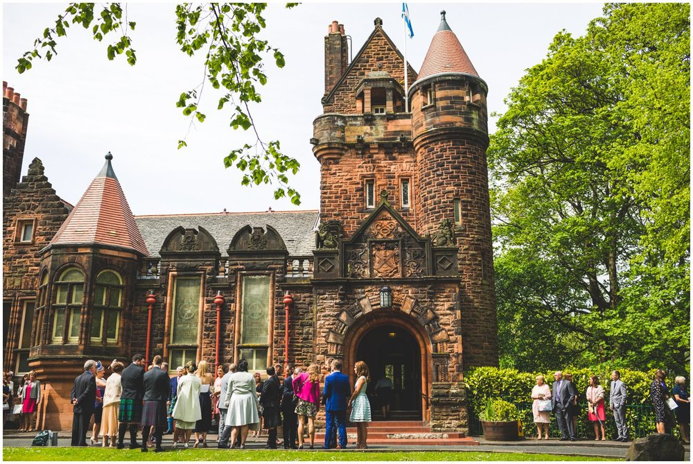 Wedding guests outside Pollokshields Burgh Hall