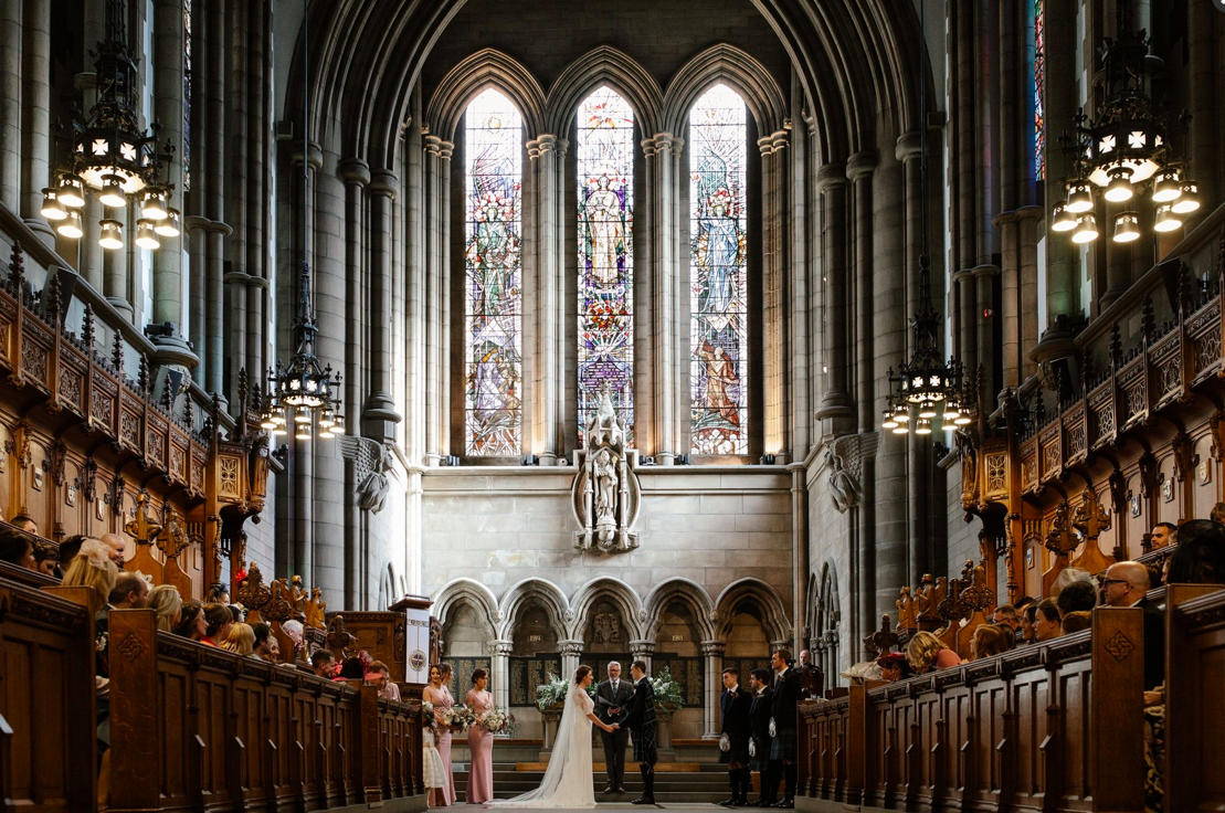 Wedding ceremony inside Glasgow University Memorial Chapel